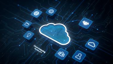 Cloud computing concept featuring a glowing central cloud connected business symbols, and digital circuit board lines on dark blue.